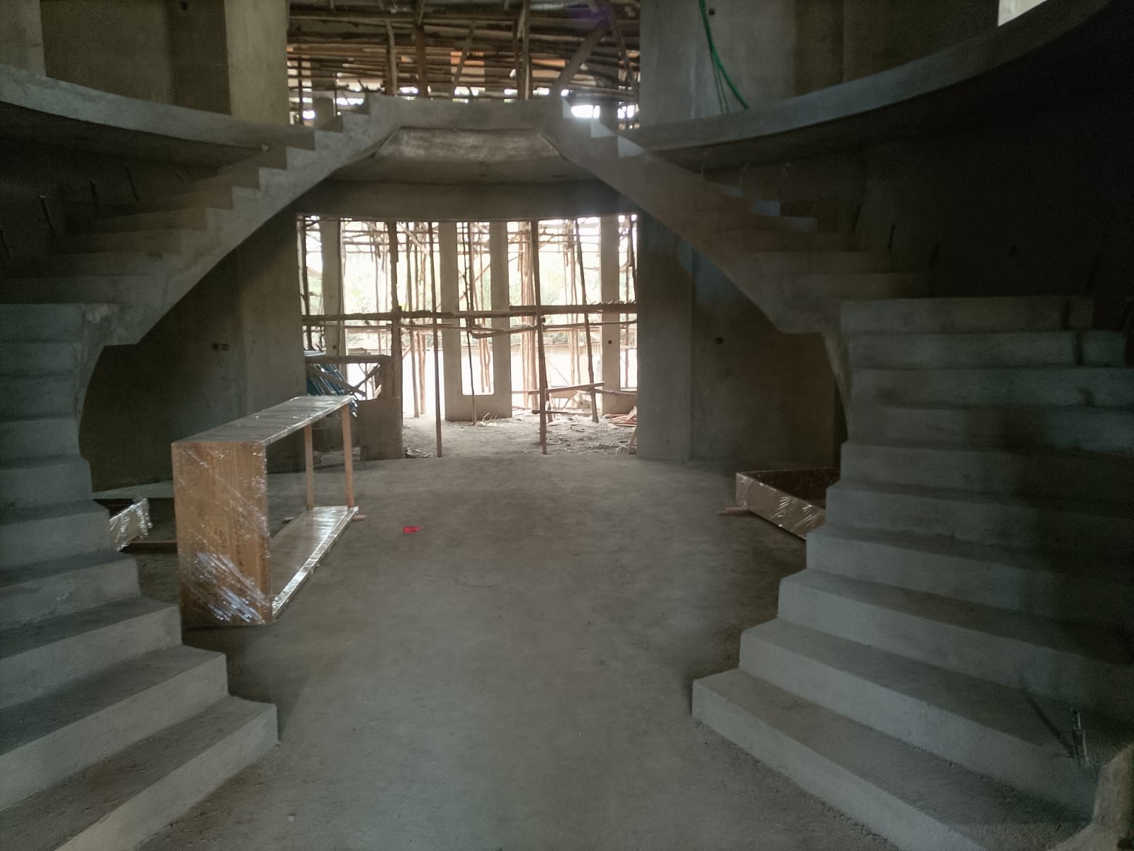 Curved architectural staircase with arched openings